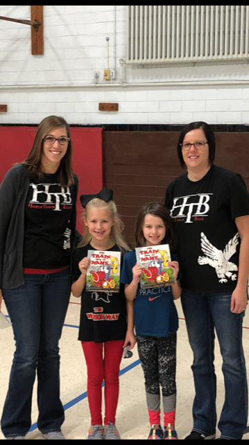  1st grade books – sponsoring books for 1st graders pictured is Tiffany & Malissa with their daughters